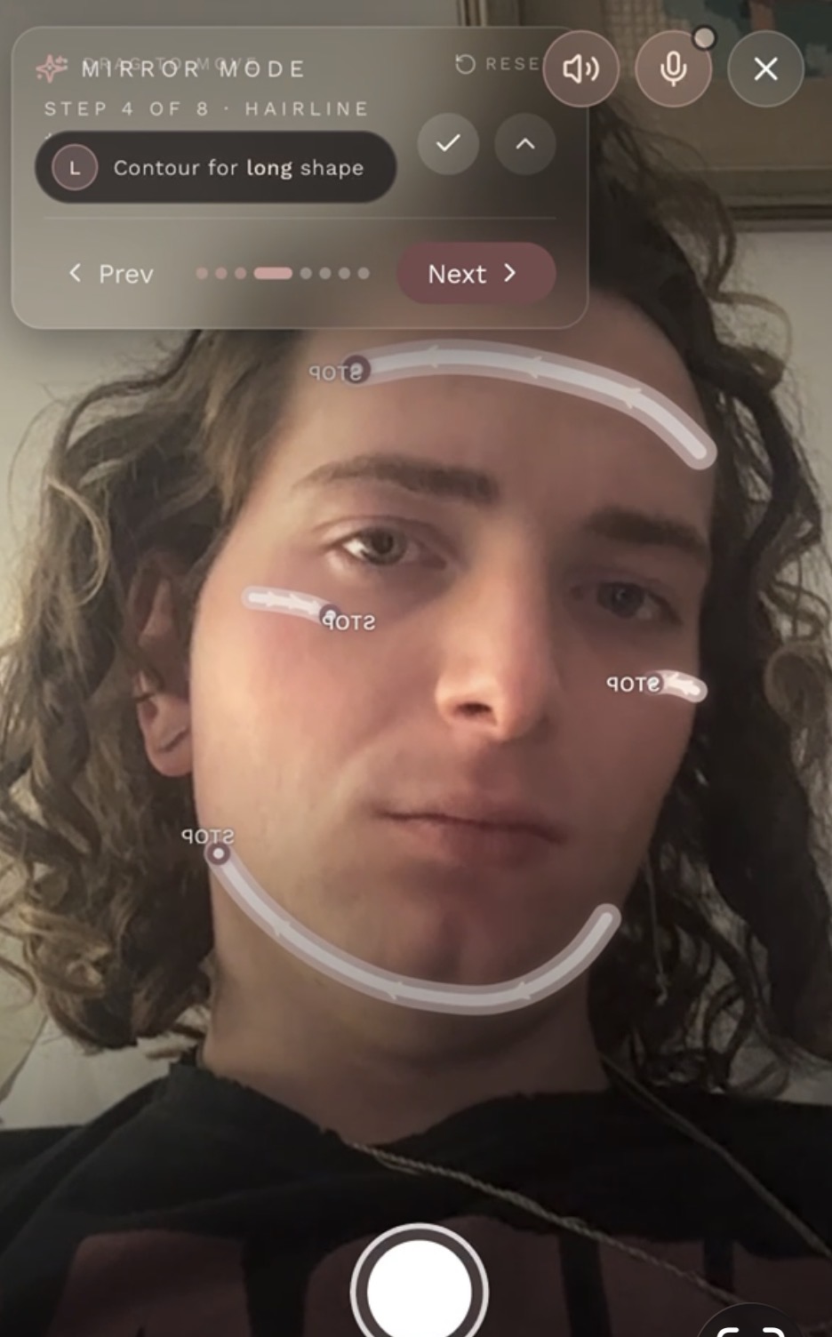 Phone screenshot of TruBeauté's Mirror Mode mid-routine, showing the hairline contour step with on-face guidance curves.